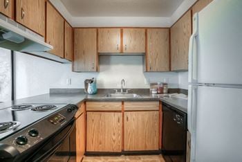 Refrigerator And Kitchen Appliances at Woodcreek Apartments, Fairview, 97024